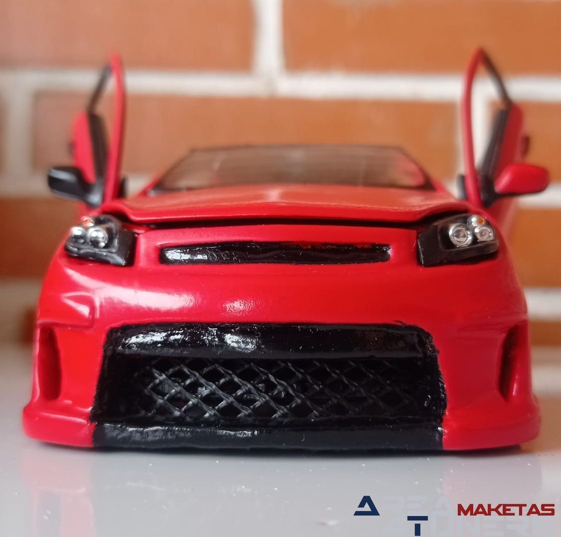 Reportaje maqueta Tuning Opel Astra Astru Imagen perteneciente al reportaje fotográfico de la revista Tuning de publicación diaria Area4tuners.es sobre una maqueta Tuning 1:24 Opel Astra