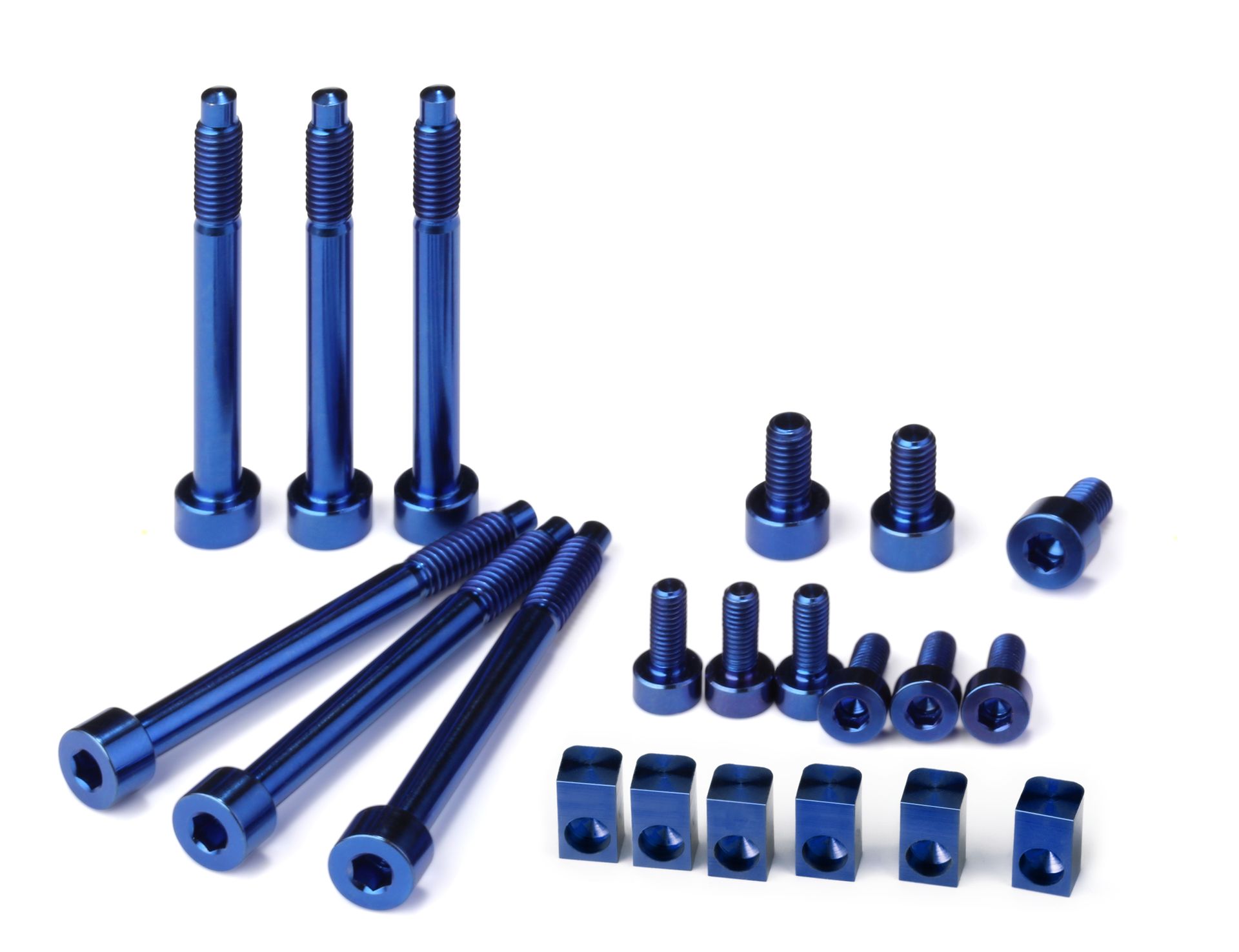 Professional, high-performance blue anodized titanium upgrade set for a 6-string Floyd Rose, Schaller Lockmeister, or similar tremolo system. Includes 6 locking screws, 6 saddle mounting screws, 3 locking nut screws, and 6 string locking insert blocks, all arranged on a white background.