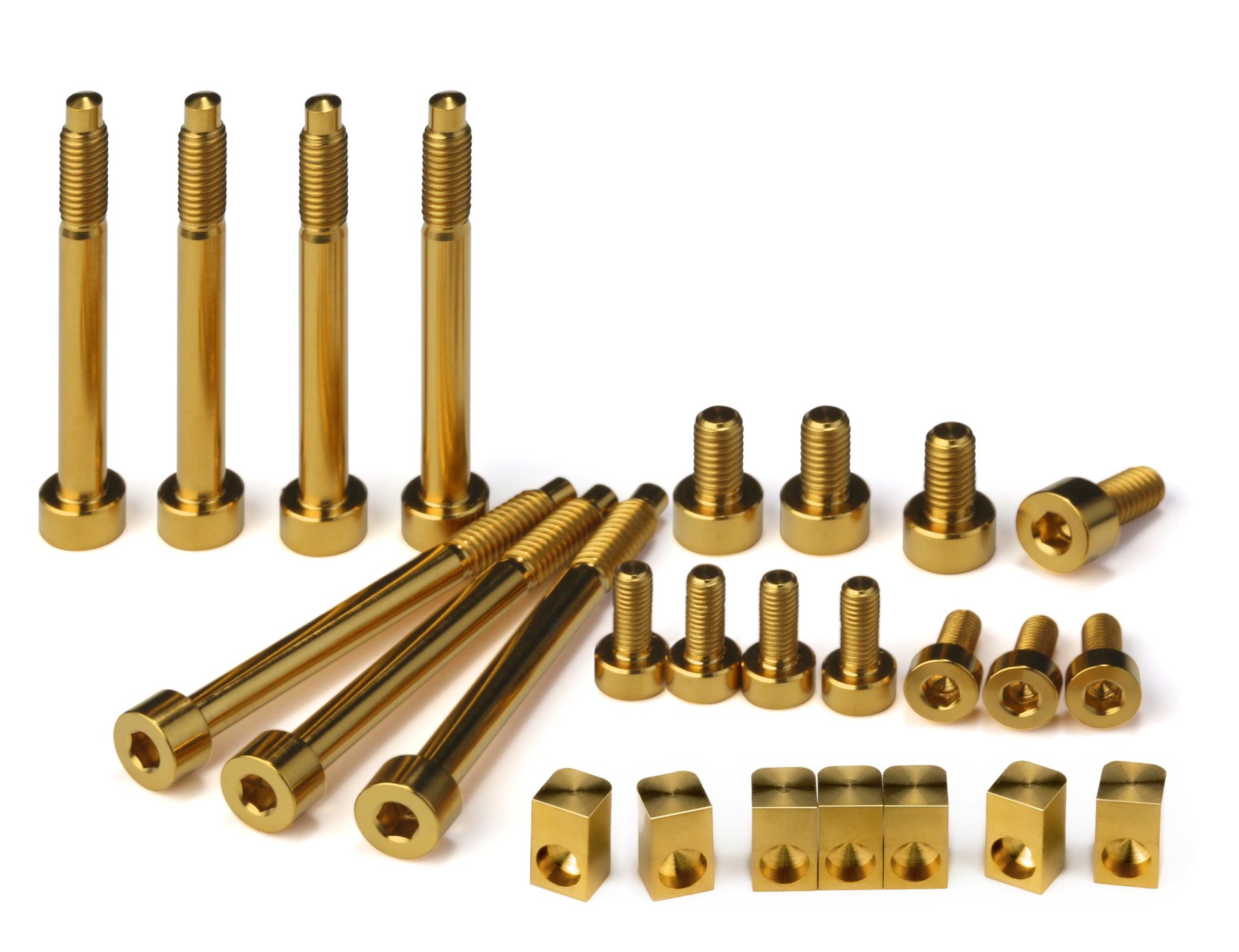 Professional, high-performance gold TiN coated titanium upgrade set for a 7-string Floyd Rose, Schaller Lockmeister, or similar tremolo system. Includes 7 locking screws, 7 saddle mounting screws, 4 locking nut screws, and 7 string locking insert blocks, all arranged on a white background.
