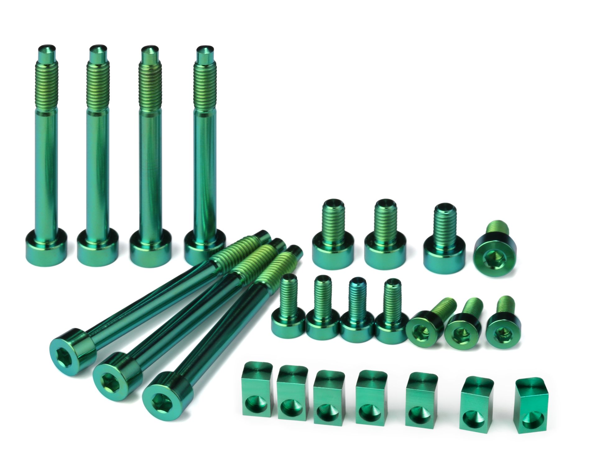 Professional, high-performance green anodized titanium upgrade set for a 7-string Floyd Rose, Schaller Lockmeister, or similar tremolo system. Includes 7 locking screws, 7 saddle mounting screws, 4 locking nut screws, and 7 string locking insert blocks, all arranged on a white background.