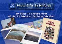 Custom designed printed family memory photo books.