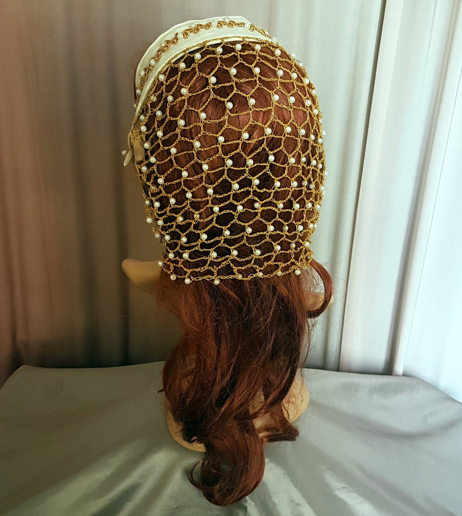 Kappe mit integriertem Haarnetz für offenes Haar