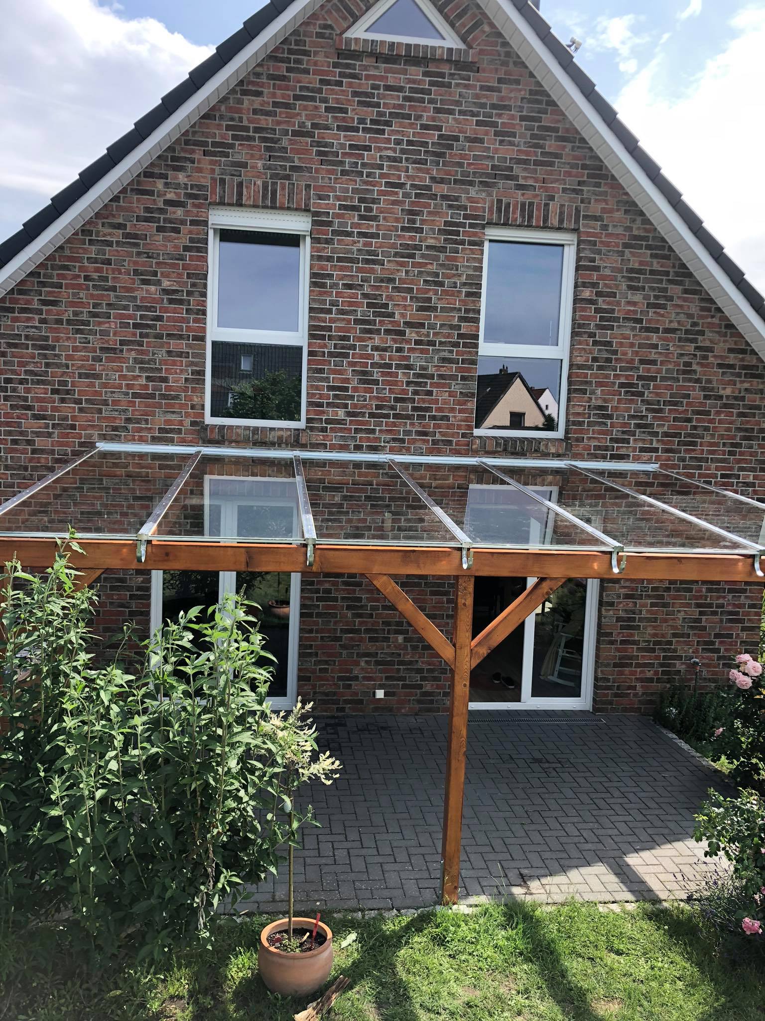 Holzglasdach mit Abdeckschienen aus Alu