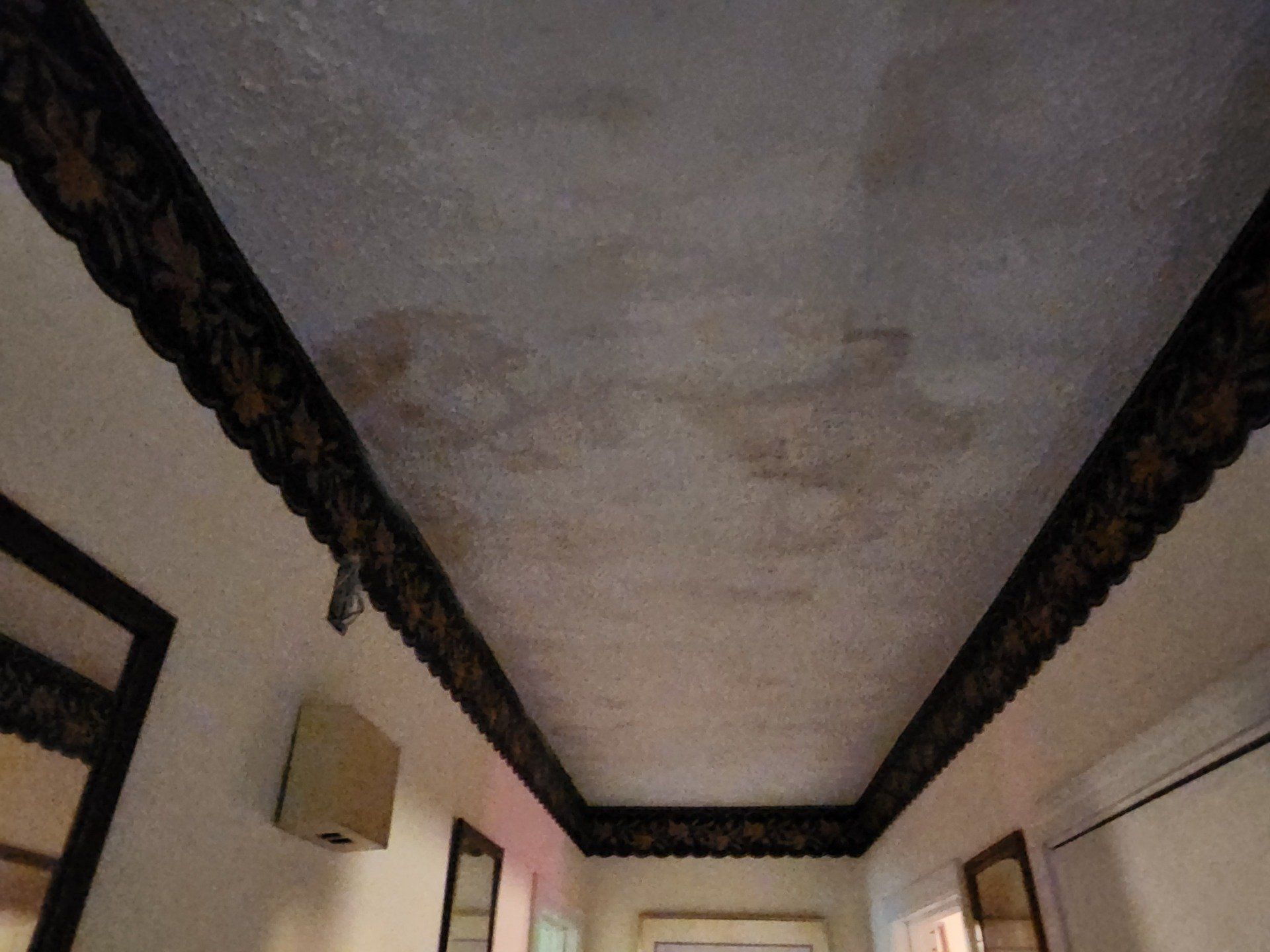 Storm water damage to ceiling drywall