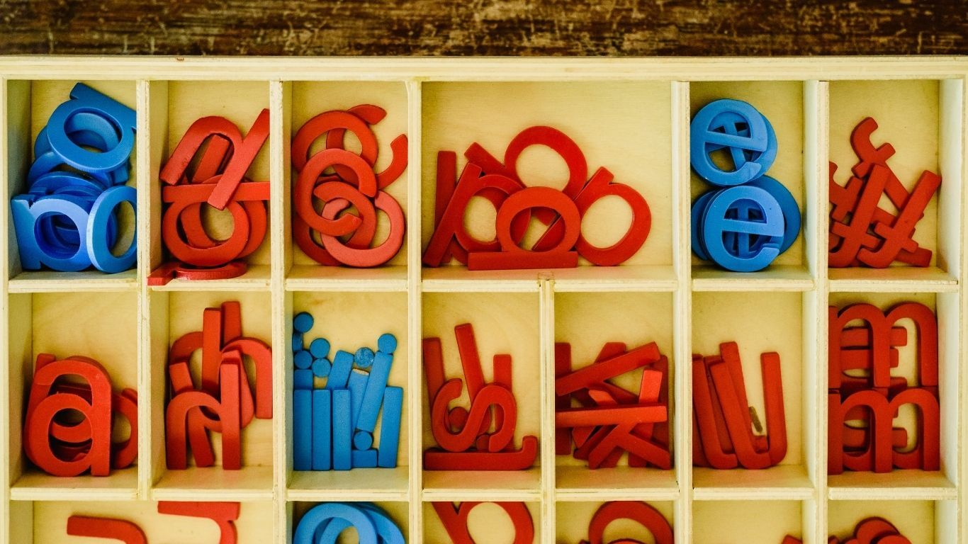 A mixed-age group using the knobless cylinders in a Montessori classroom. A mixed-age group of children using the knobless cylinders in a Montessori classroom.
