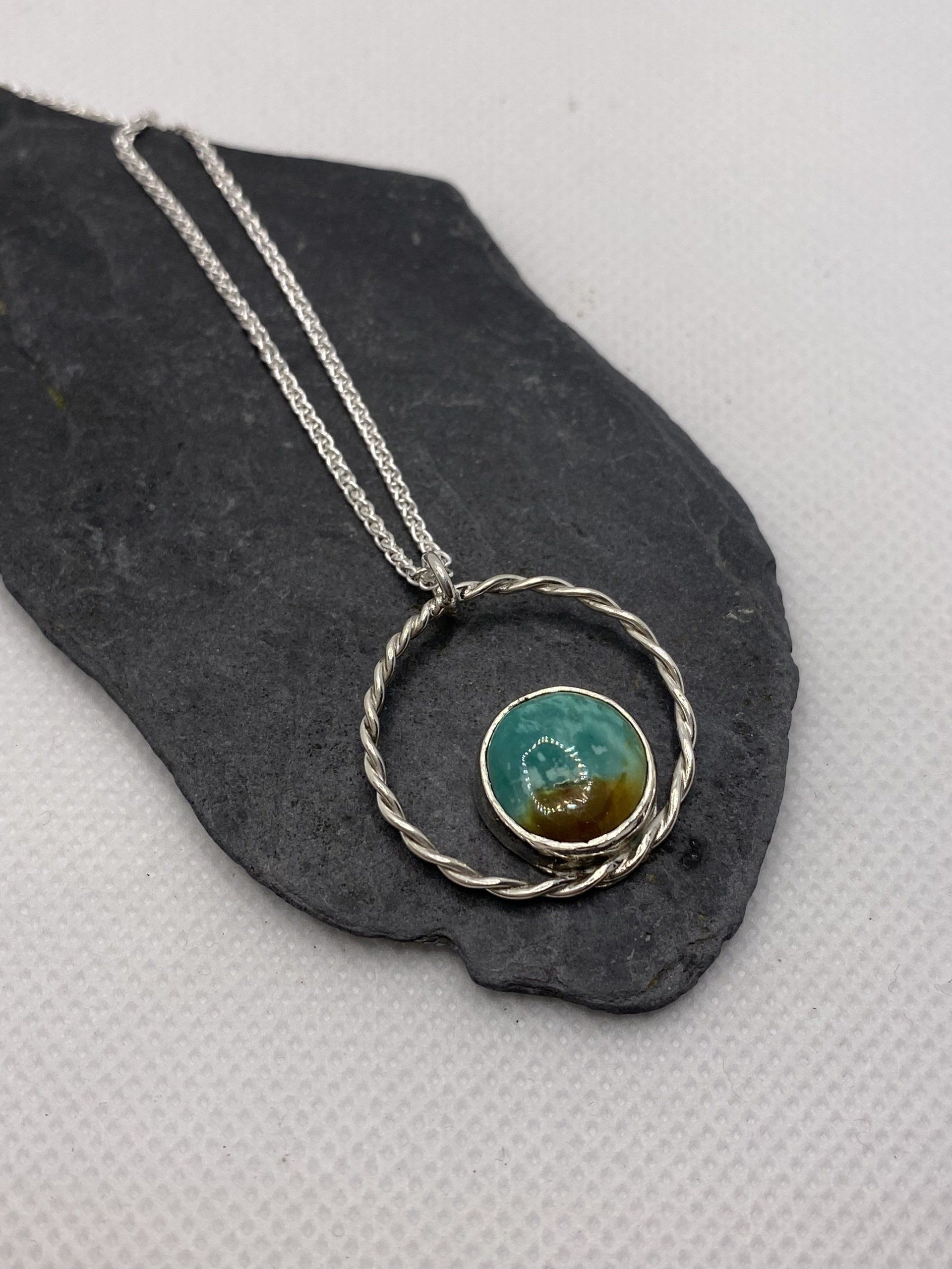 A turquoise pendant