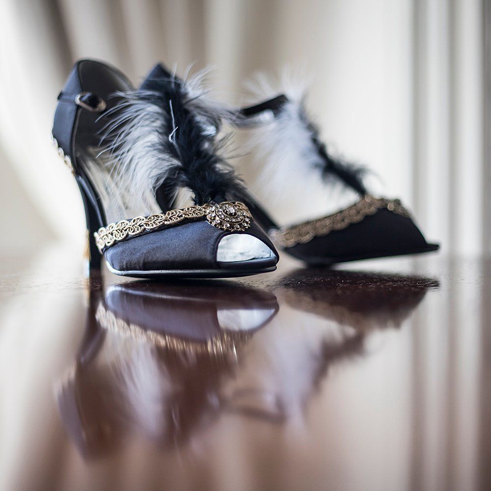 Black Love lace shoes with feathers