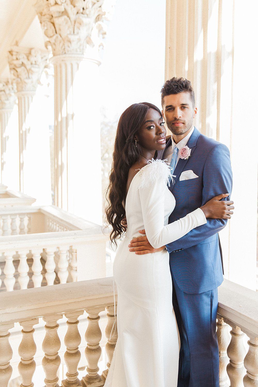 Bride and Groom hugging each other outside Carlton House Terrance London