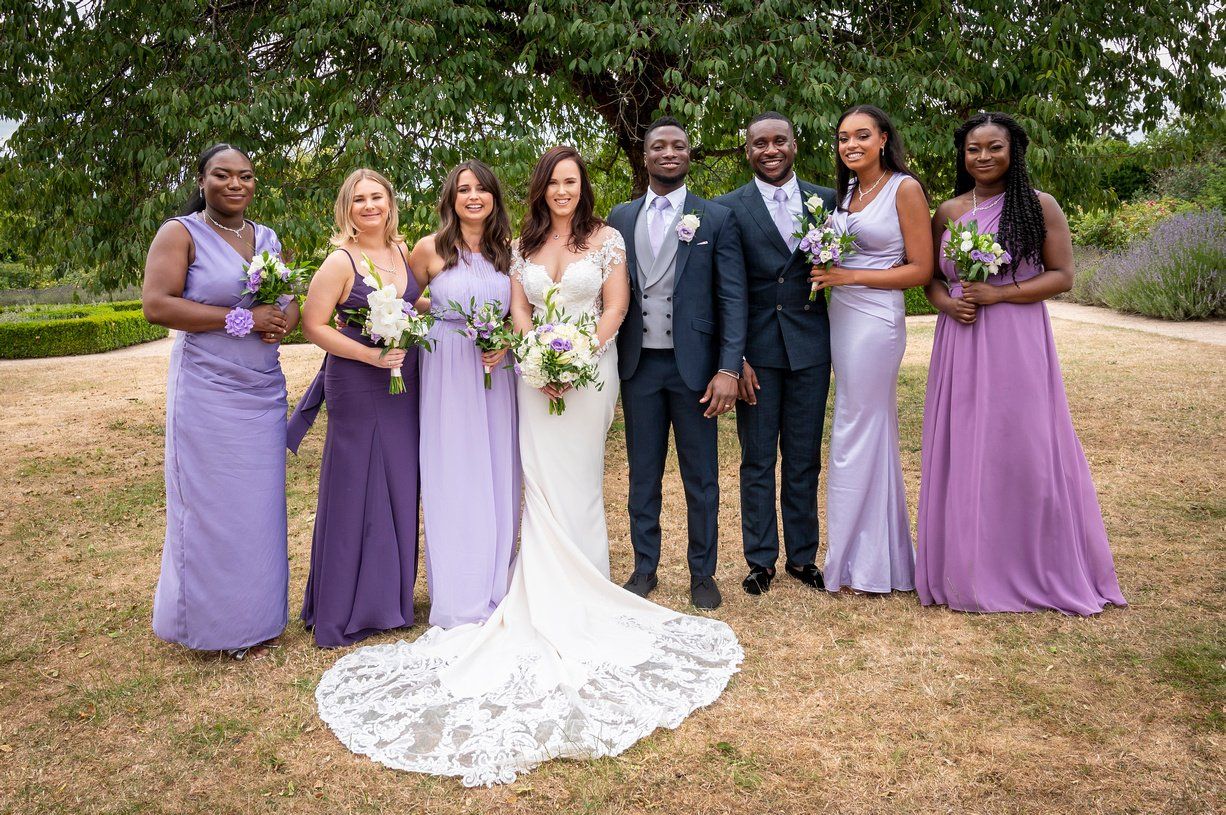 Fusion wedding couple with bridal party