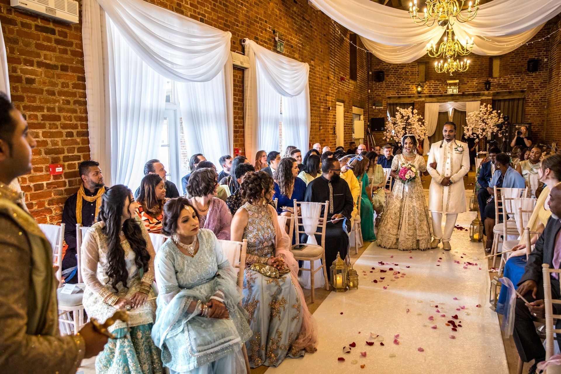 Wedding ceremony entrance of Indian Bride walking down the aisle