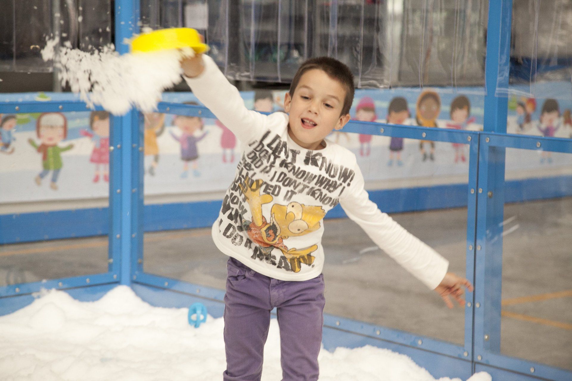 Children playing inside a Snow Playbox enclosure