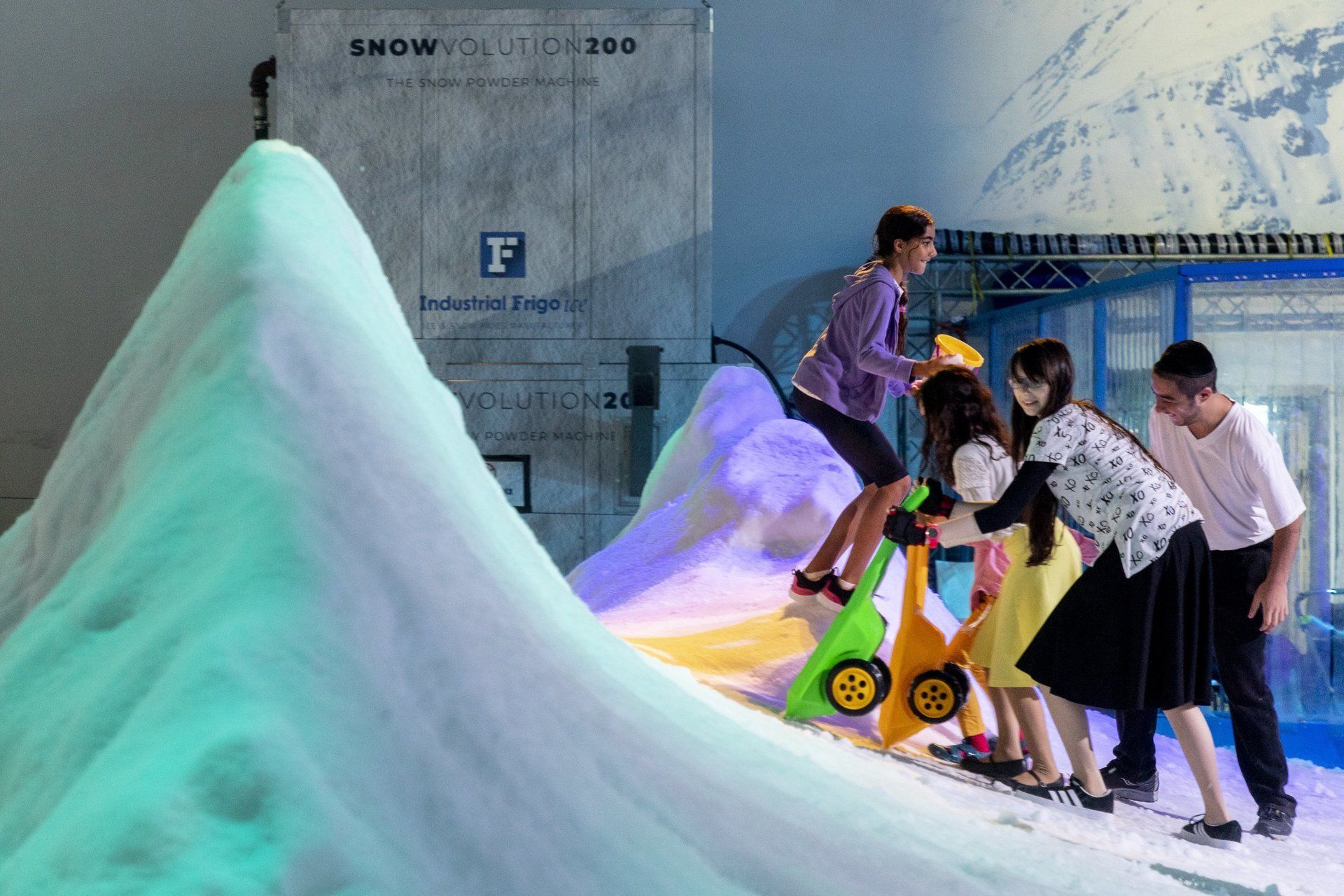 Children playing in snow playground