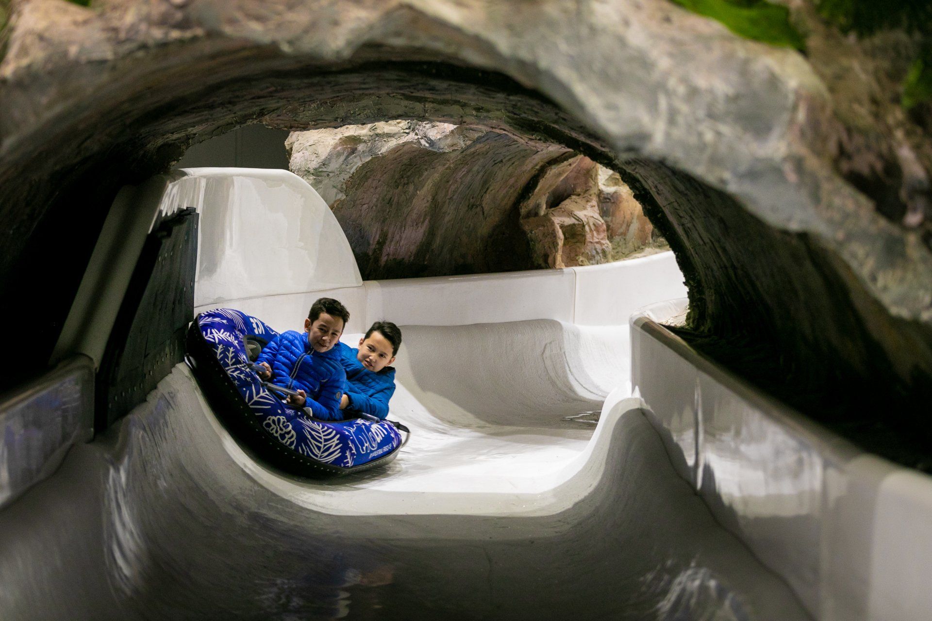 Mini bob sled racing down the slide