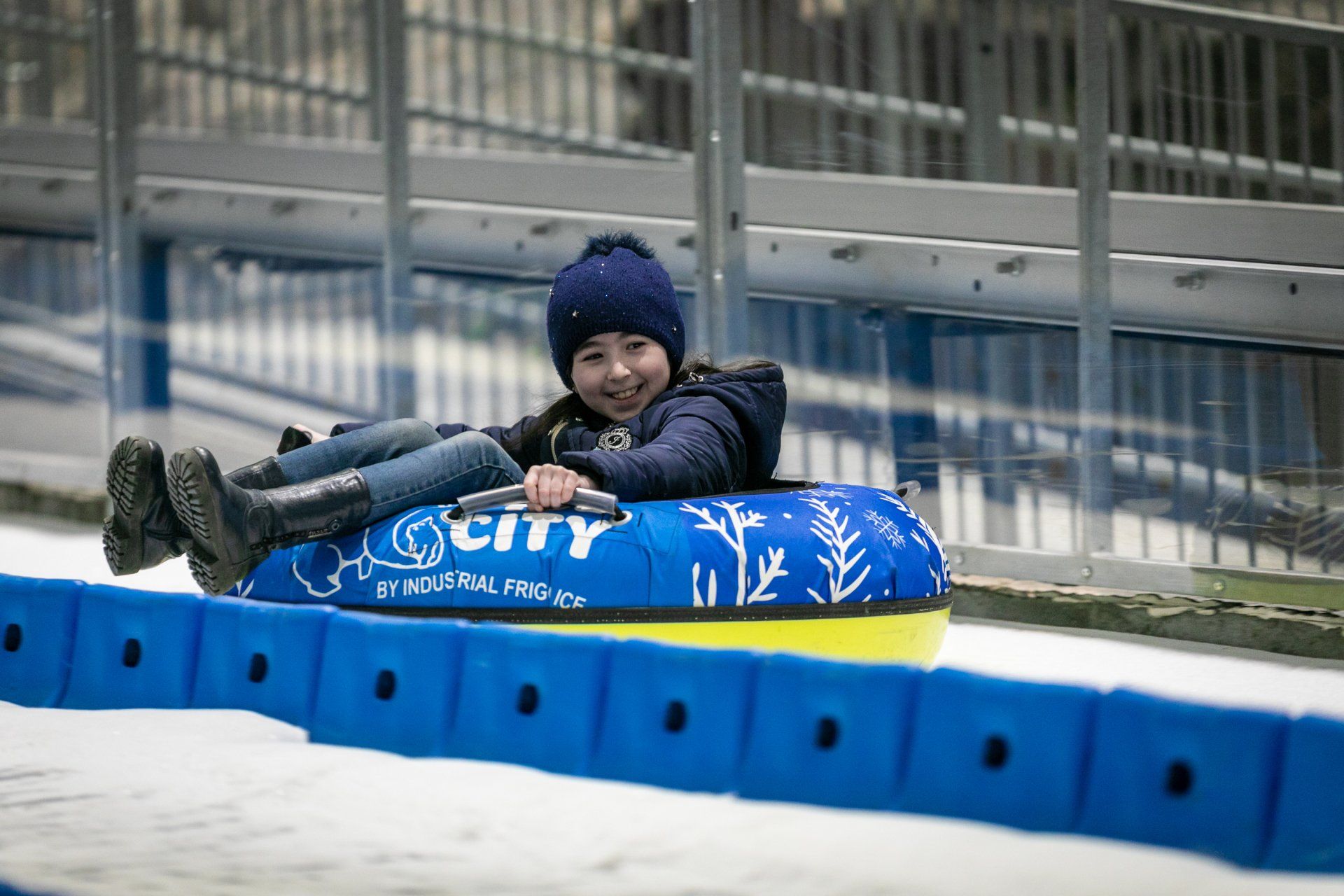 Rider sliding down an ice slide
