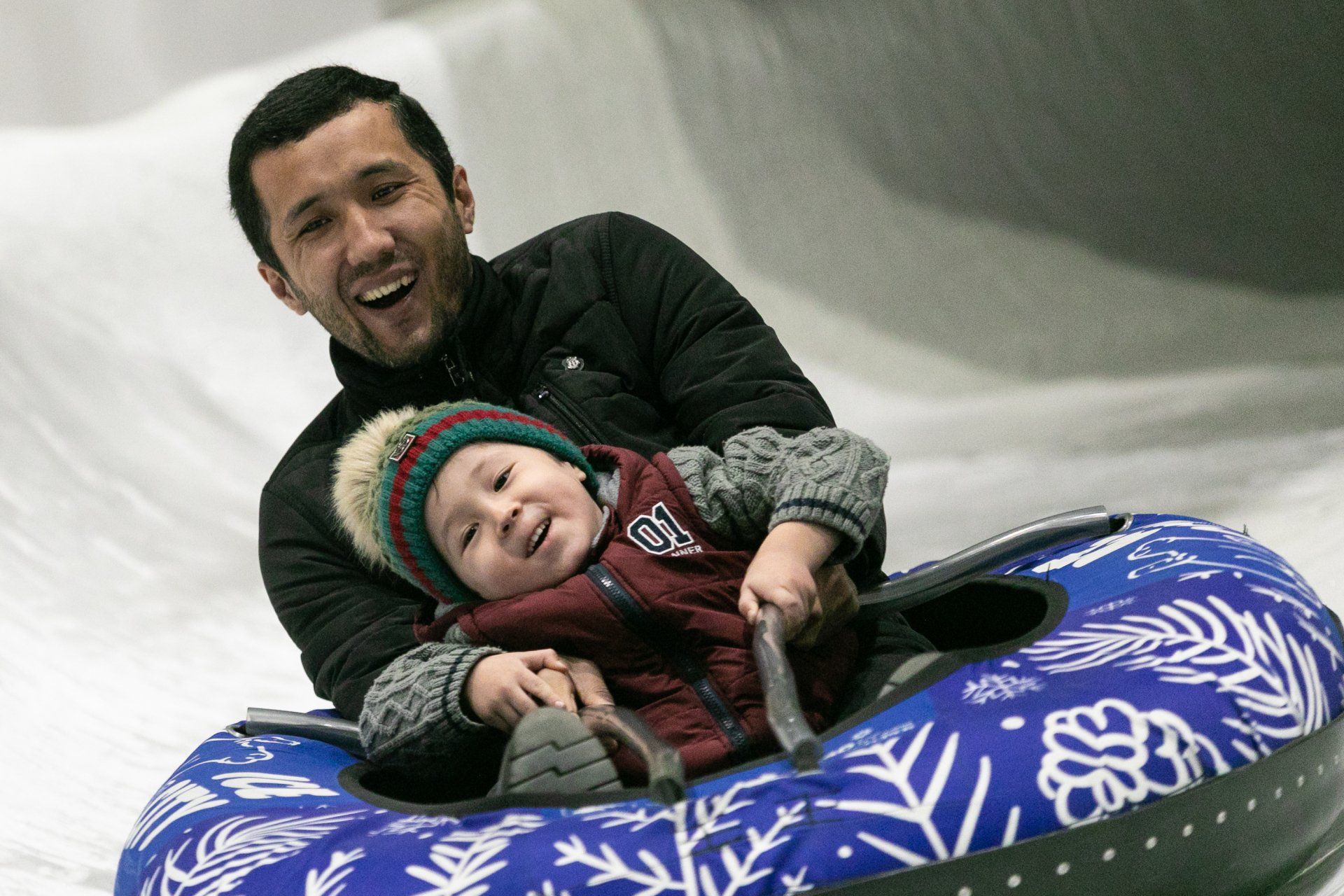 Mini bob sled racing down the slide