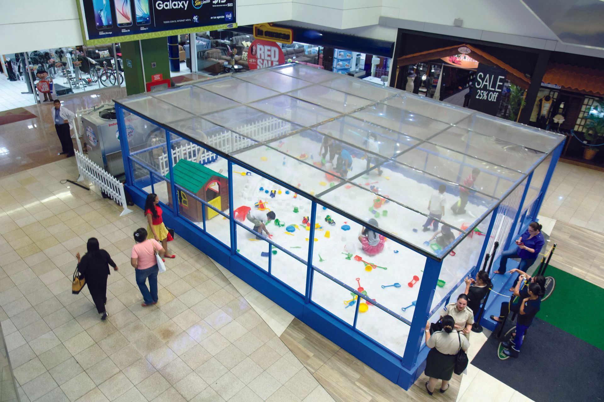 Snow Playbox Children playing inside a Snow Playbox enclosure
