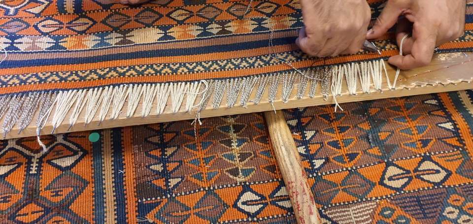 travail sur un tapis