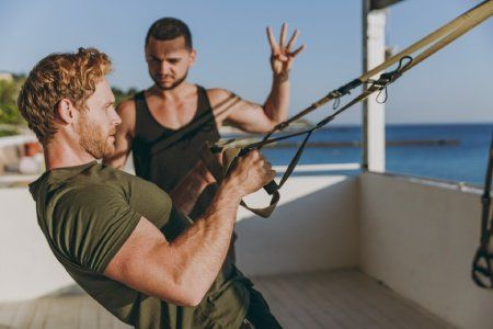 person working out with trainer