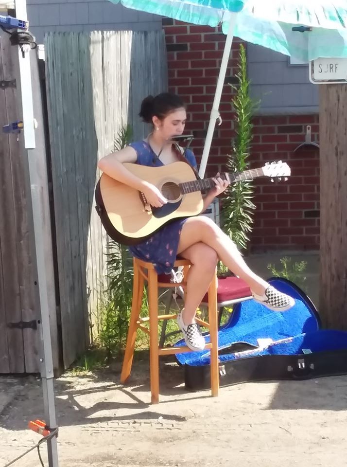 Shannon performing at the Surf City Farmer's Market