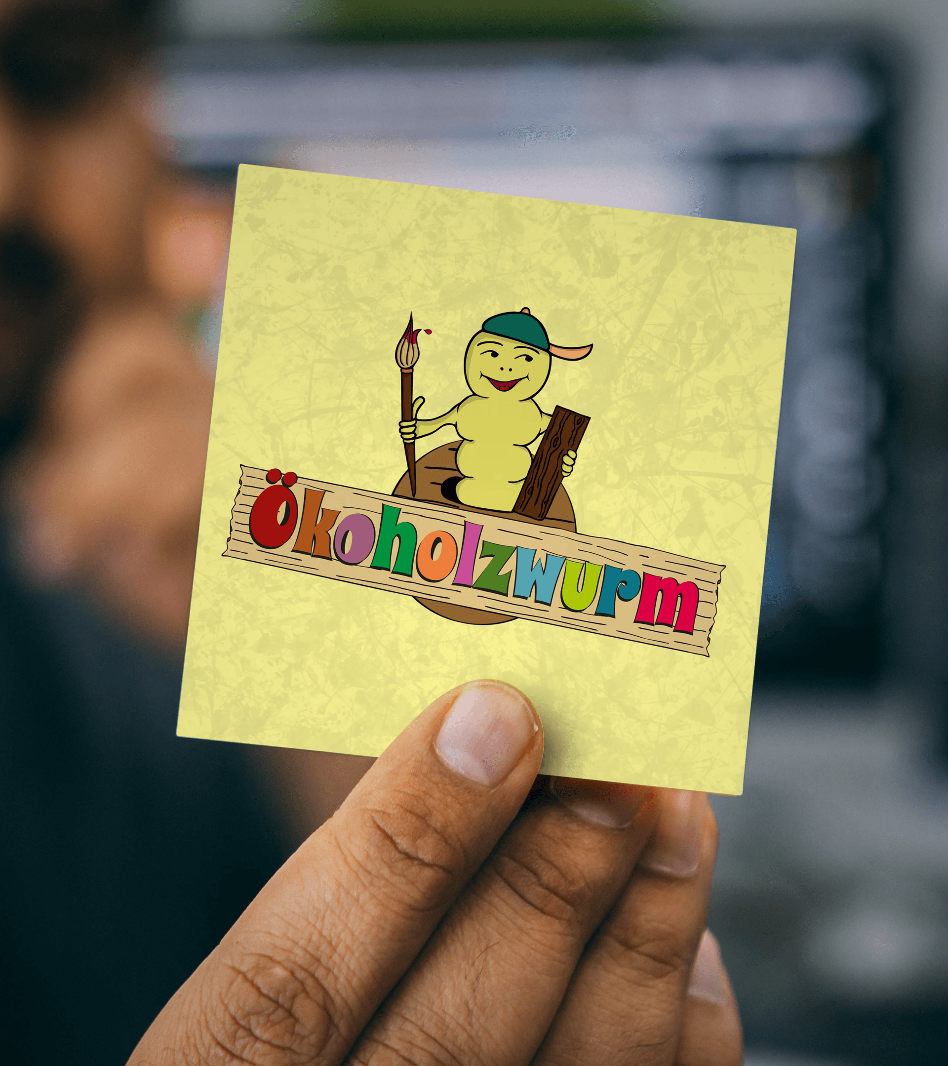 Ökoholzwurm Holzspielzeug Logo Signet