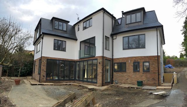 Modernised home with bespoke timber framing and herringbone cladding, fully renovated by Richard Norton Construction on Sunderland Avenue in North Kent.