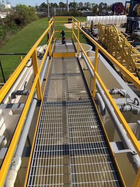 Metal bridge above water treatment