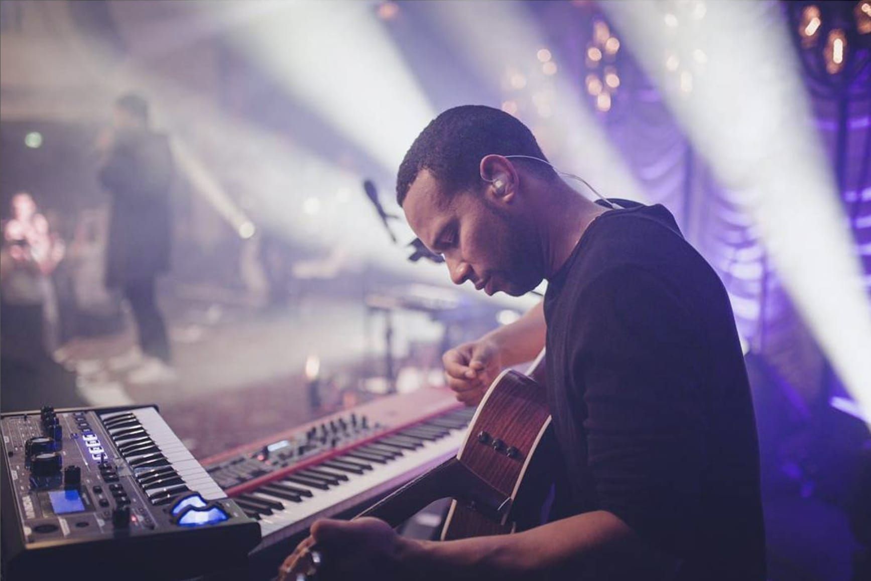 Taka Joseph Musician performing live on stage