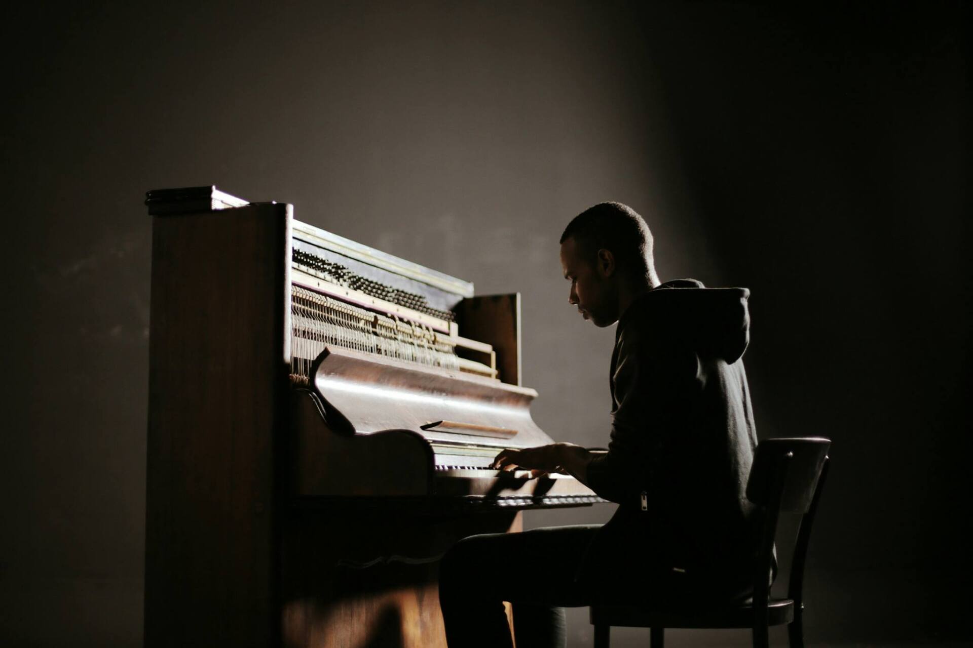 taka joseph piano taka joseph music taka jc cologne upright piano musician singer