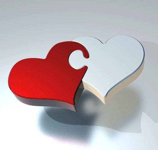 Red heart interlocks with white heart