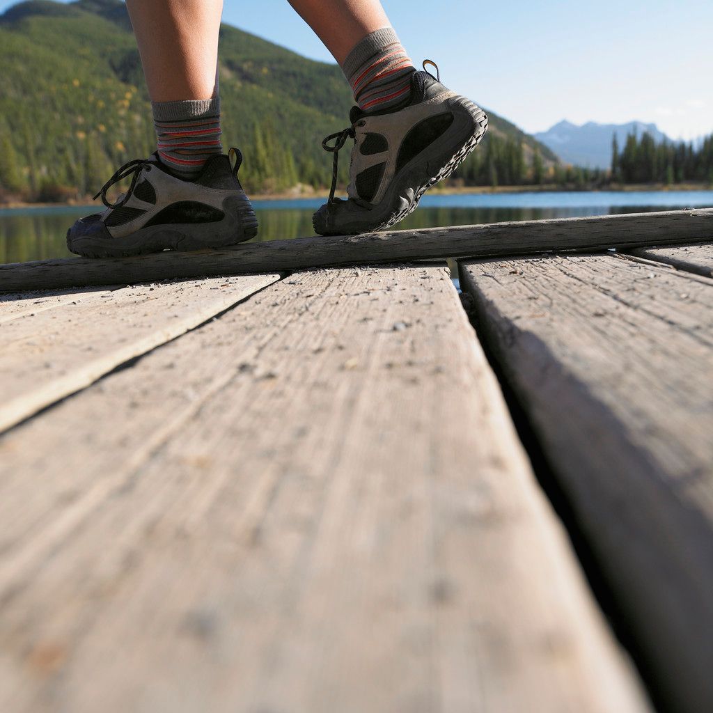 feet on wooden planks