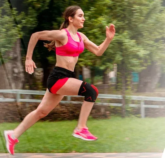 Woman in pink running fast