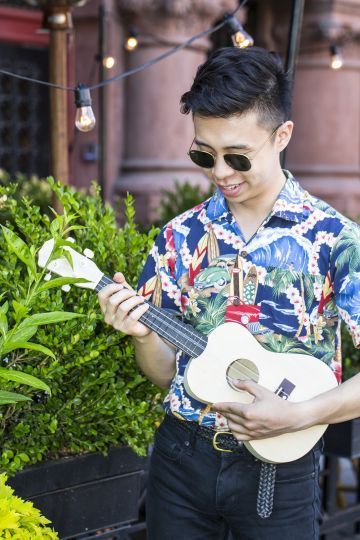 Boy playing Ukulele