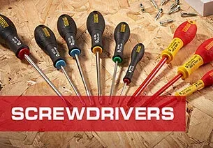 Screwdrivers on a background of wood