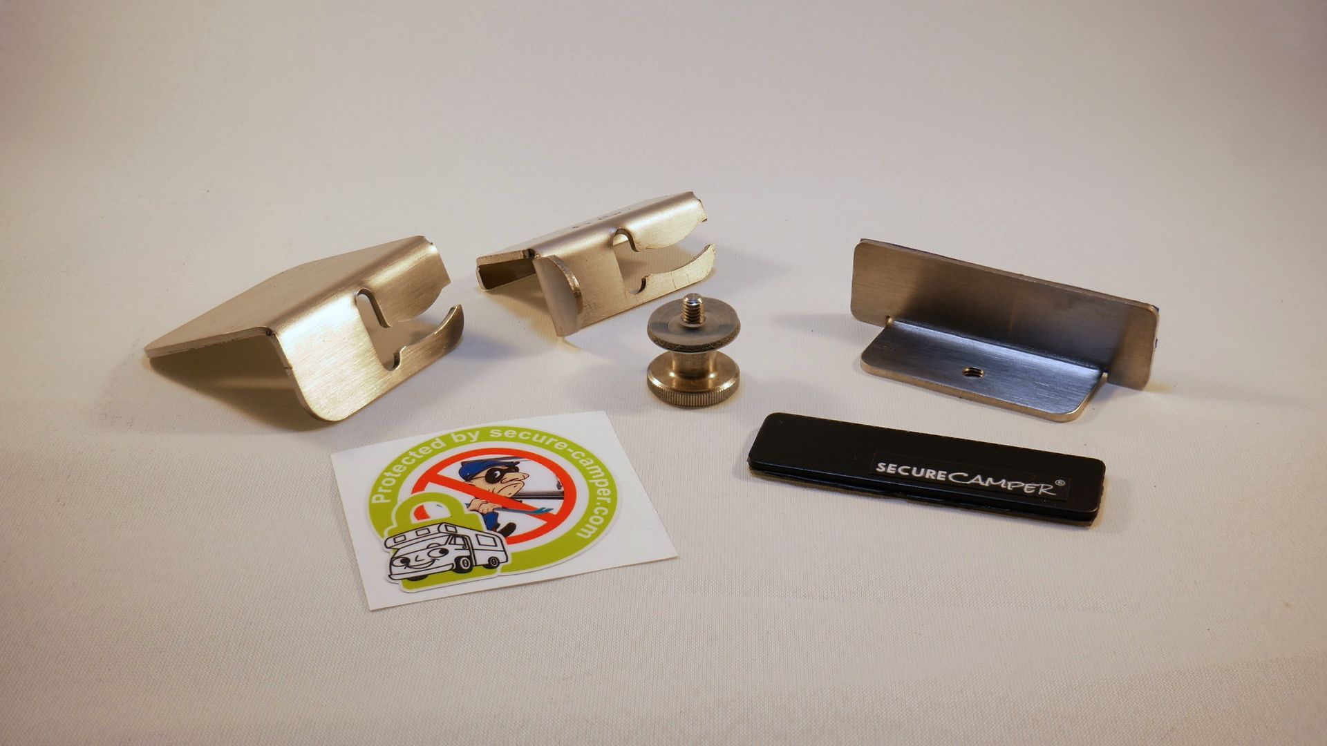 Profilé de sécurité de taille « small », surface adhésive de 7 cm, lorsque l'espace disponible sur la fenêtre est réduit. Profilé de sécurité de taille « small », surface adhésive de 7 cm, lorsque l'espace disponible sur la fenêtre est réduit.