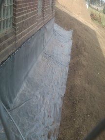 Foundation Waterproofing Using A Rubber Membrane
