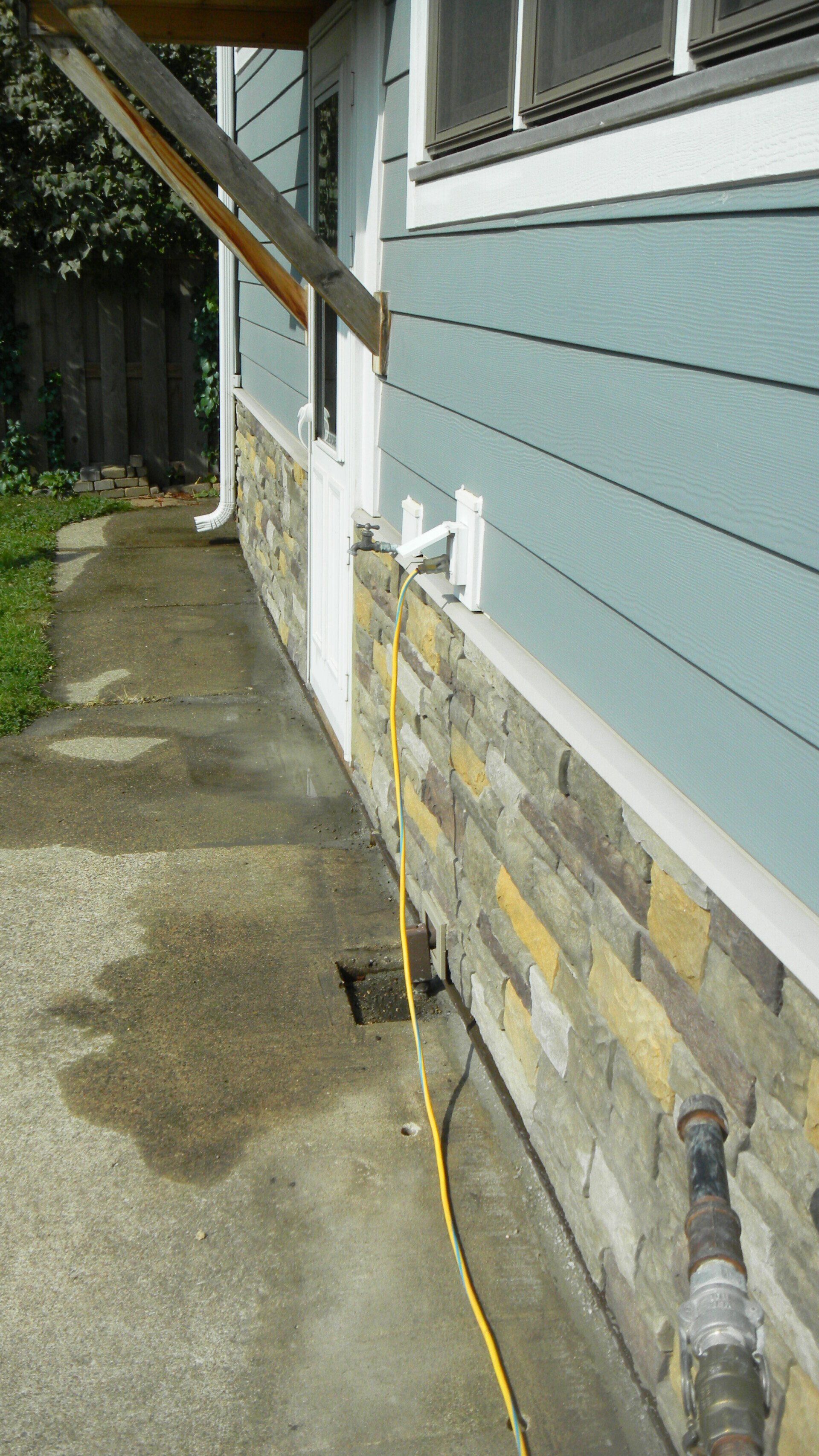 Waterproofing Saint Paul Foundation using exterior bentonite injections.