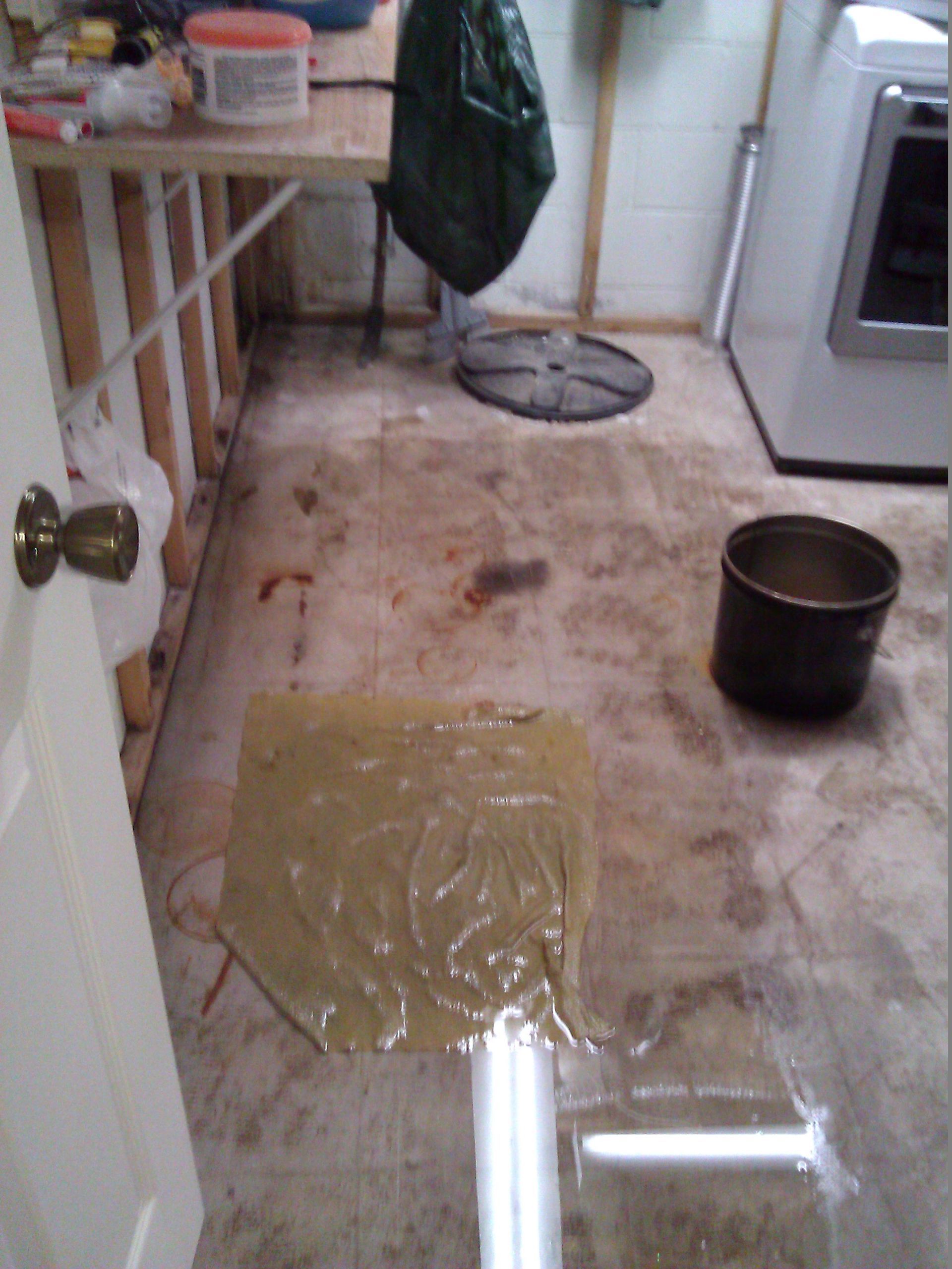 Wet basement next to drain tile sump basket New Hope MN