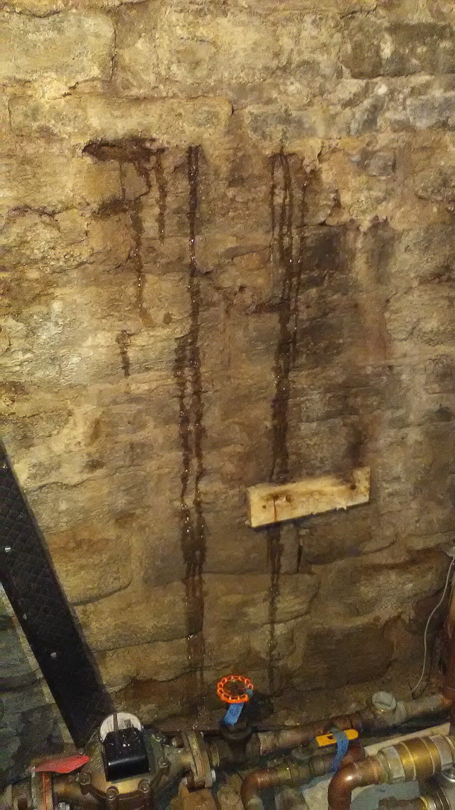 Waterproofing Saint Paul Stone Wall Foundation using exterior bentonite