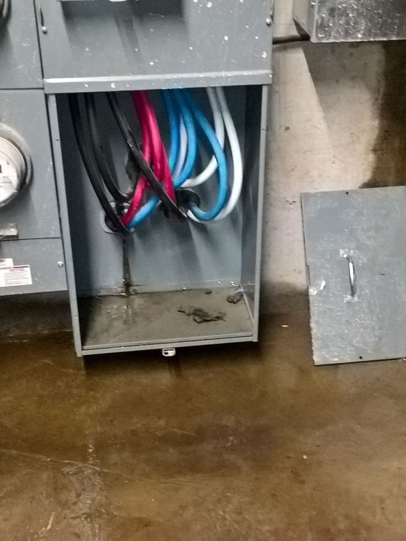 Basement waterproofing apartment building utility room