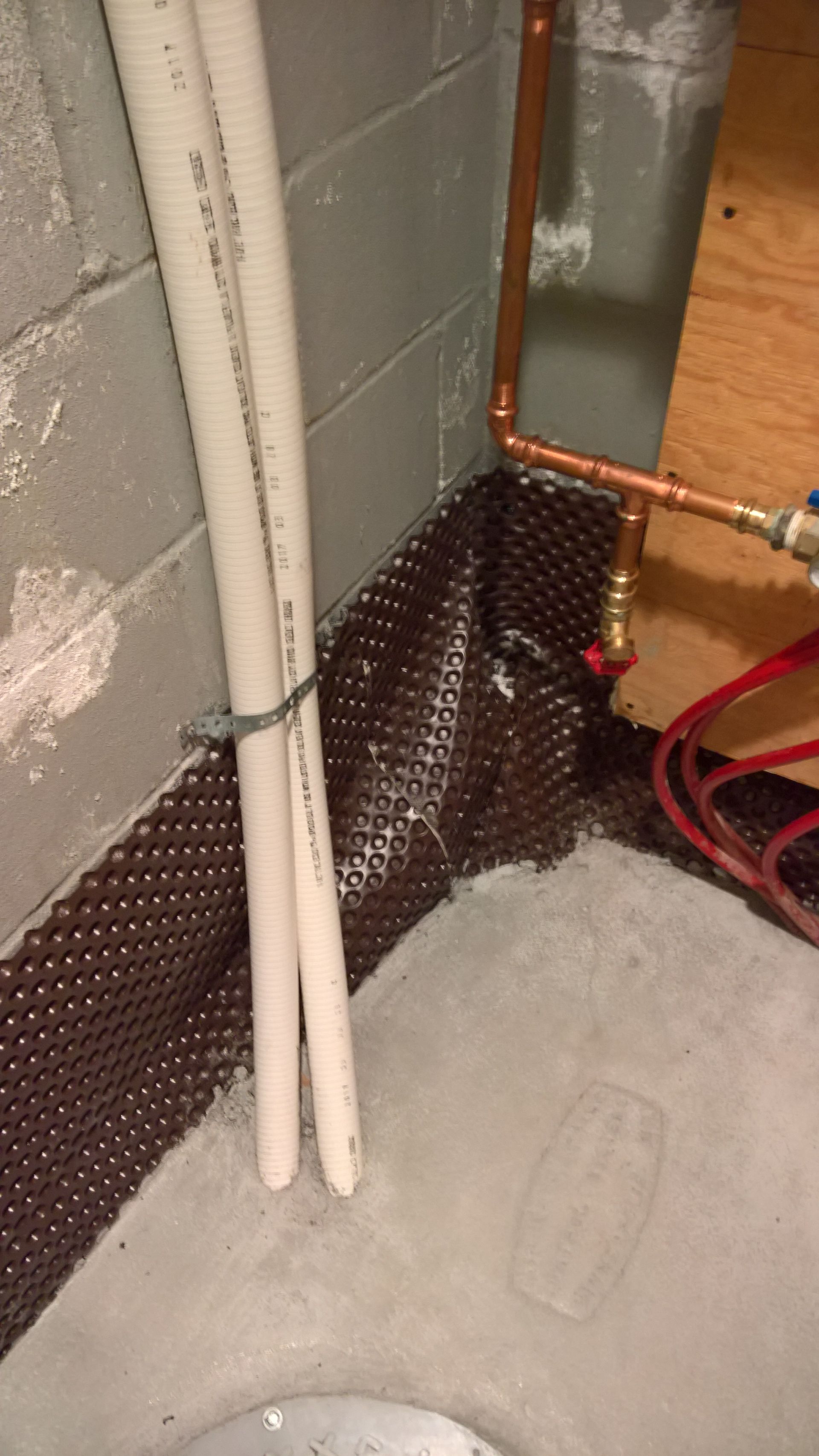 Dimple Board used for waterproofing basement walls.