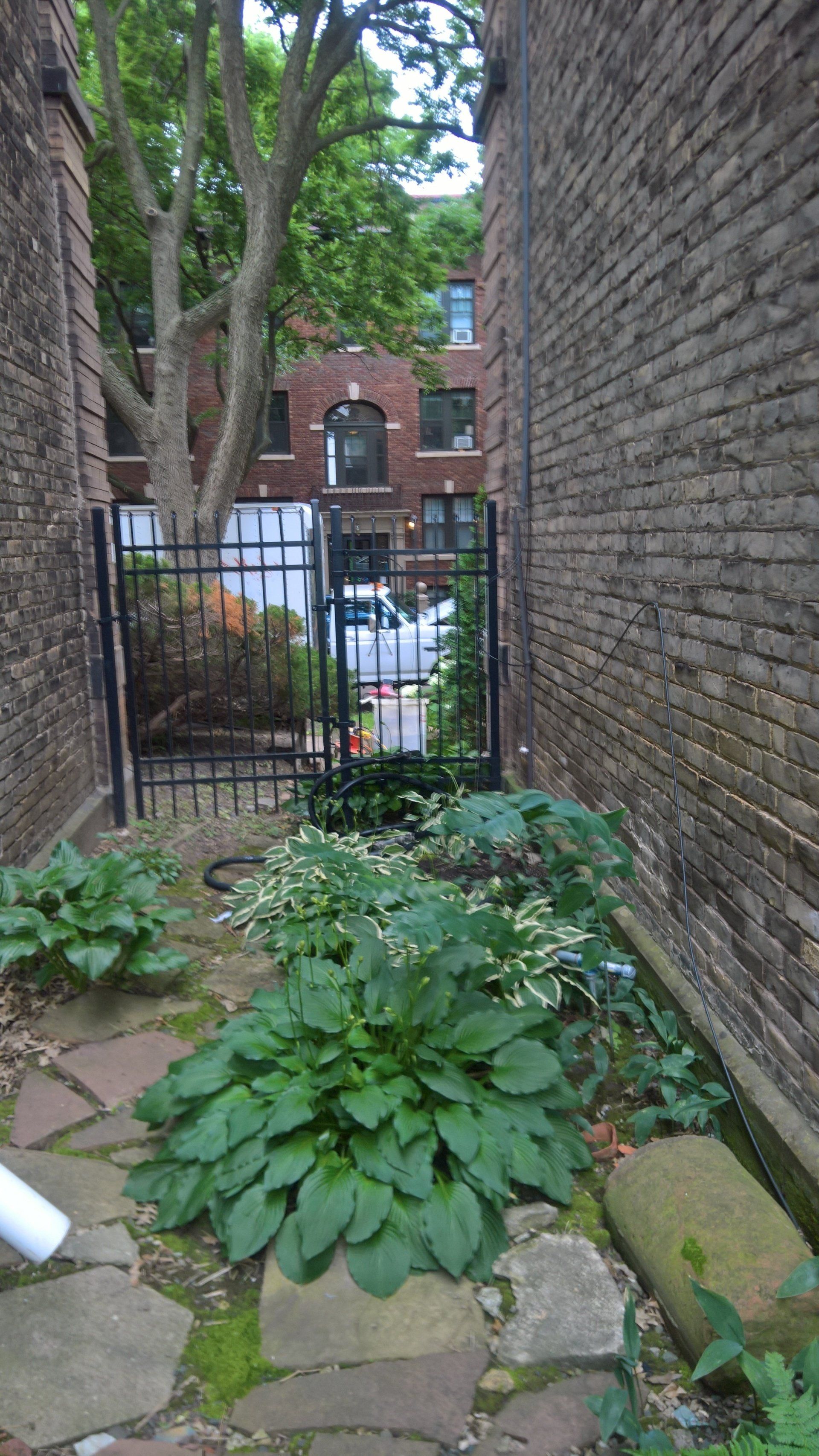 Waterproofing Limestone Blocks on older Saint Paul Condo Building Foundation