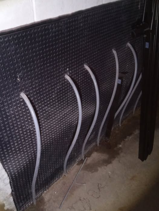 Dimple board basement waterproofing