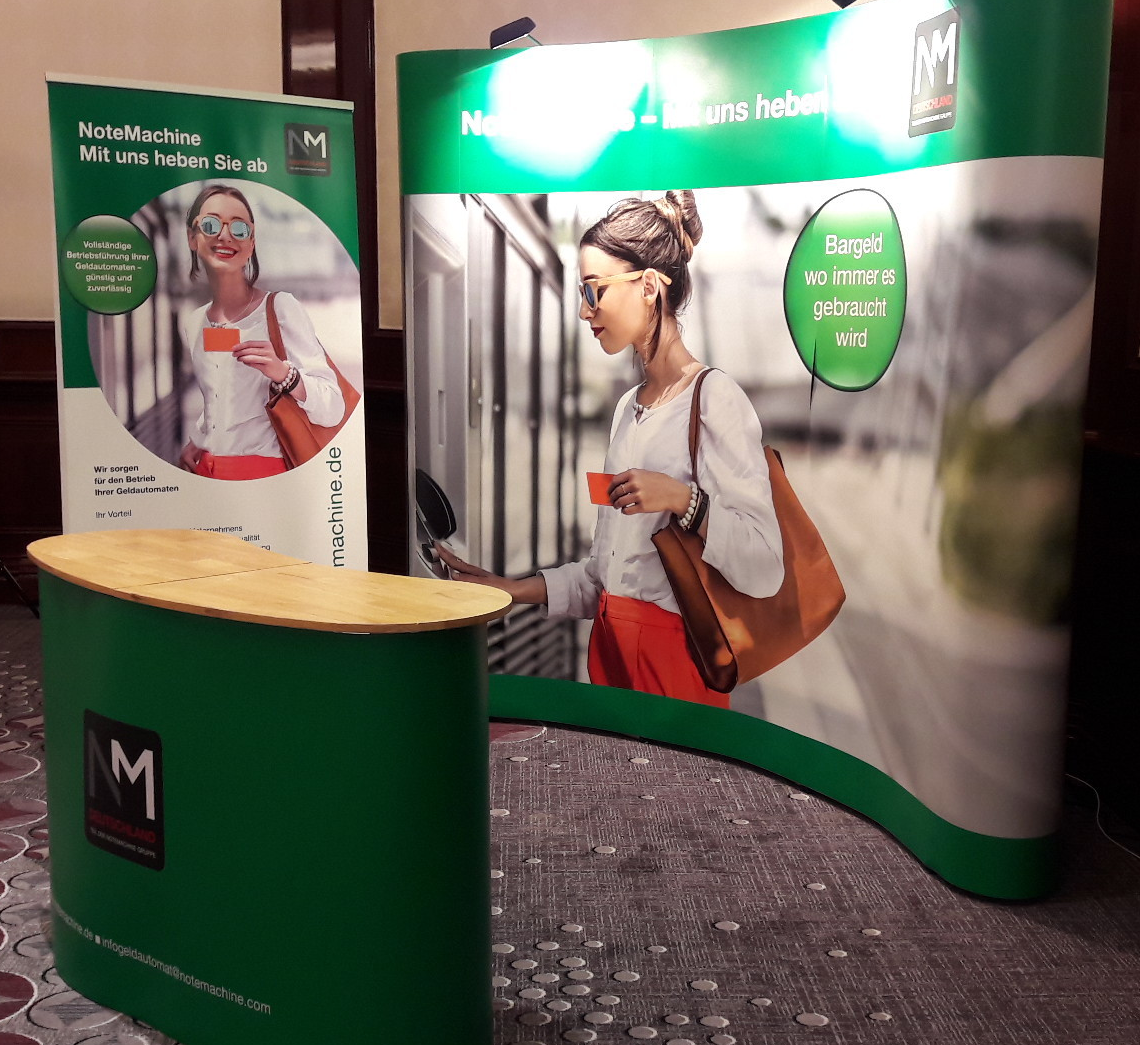 Anke Oceguera-Klartext-Agentur für klare Kommunikation-Angebot Roll-up-Referenz Messestand NM Deutschland GmbH