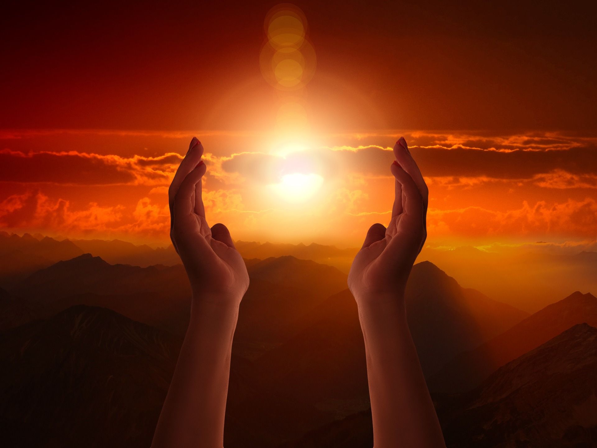 praying hands with sunset with review