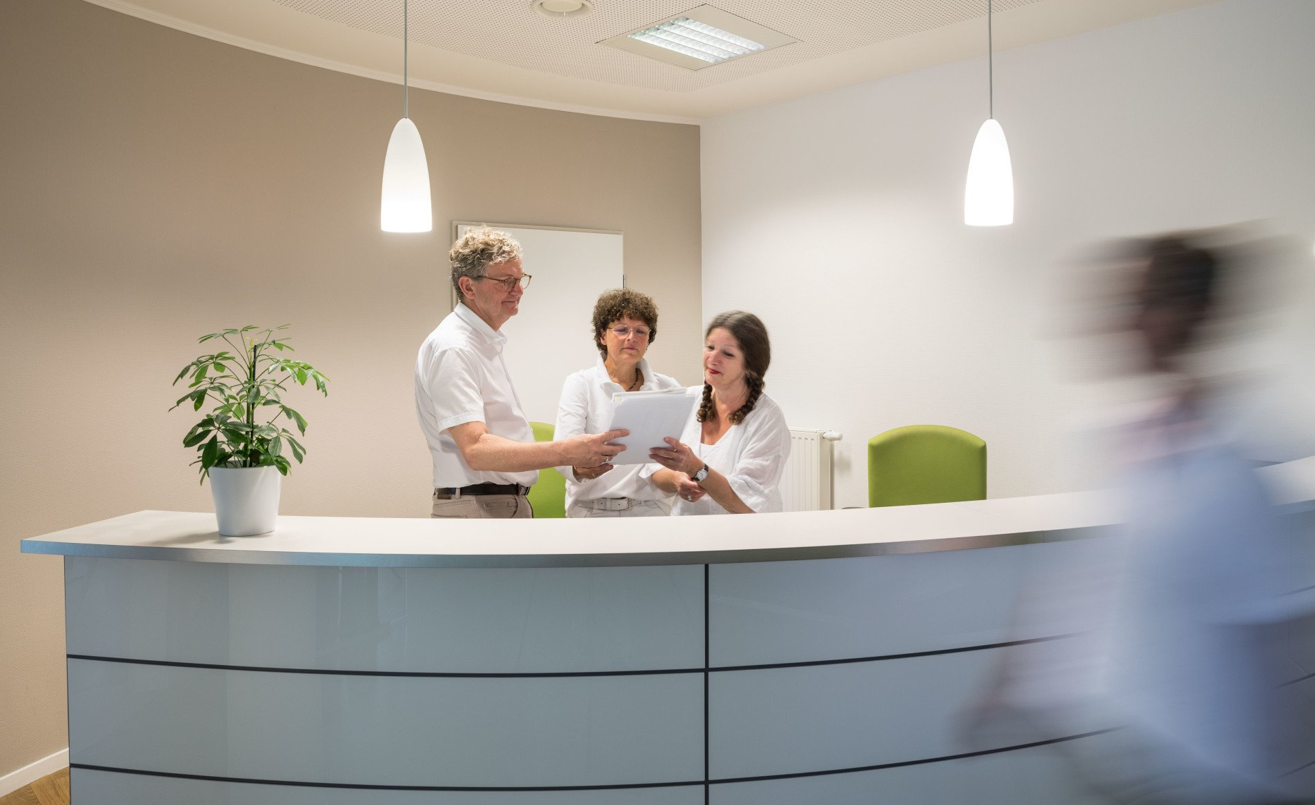 Foto Mediziner und Medizinische Fachangestellte