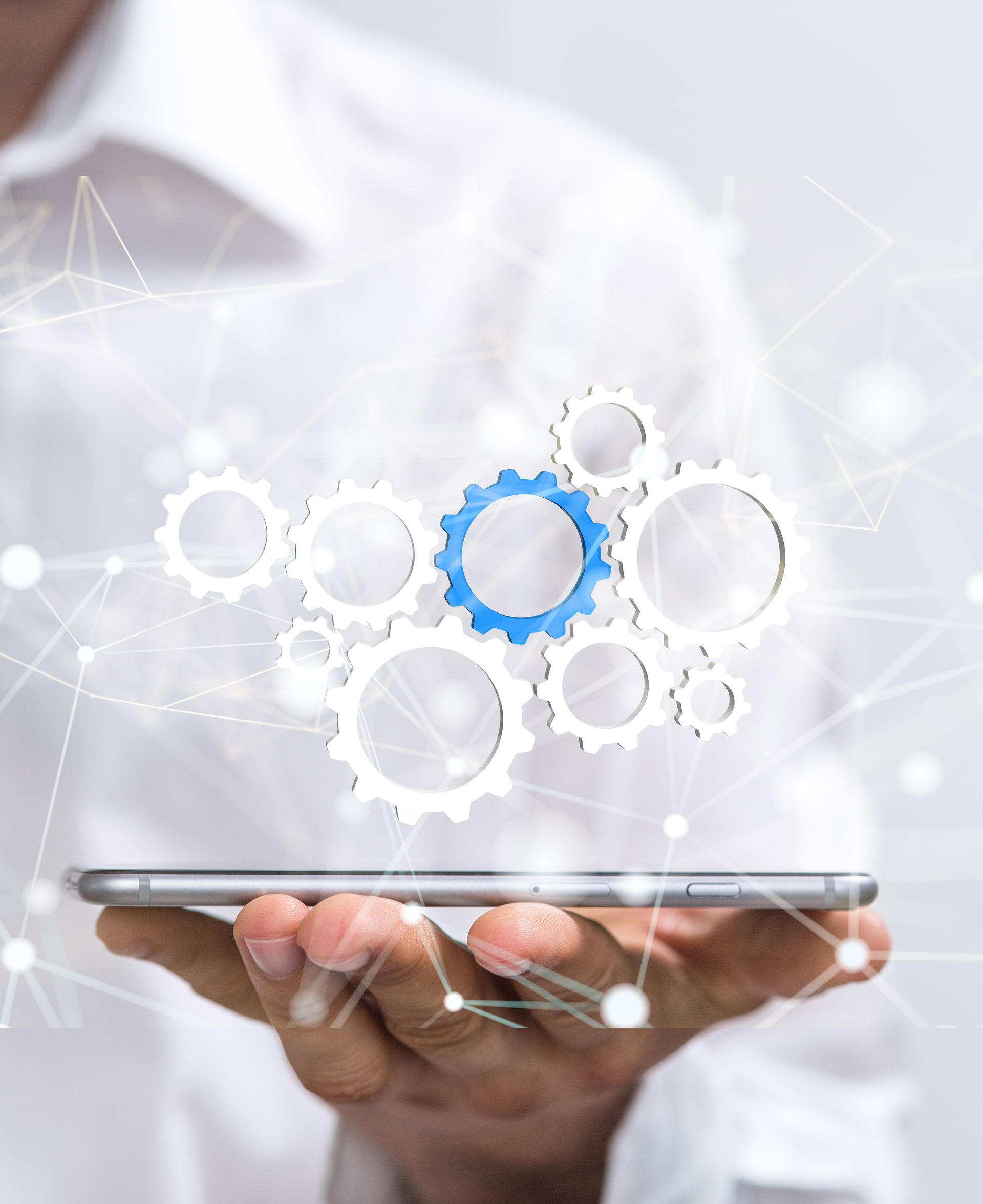 Gears above a laptop