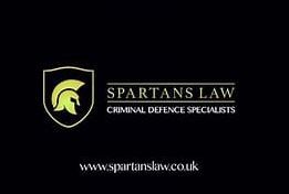 Spartans law text with helmet next to it in black background
