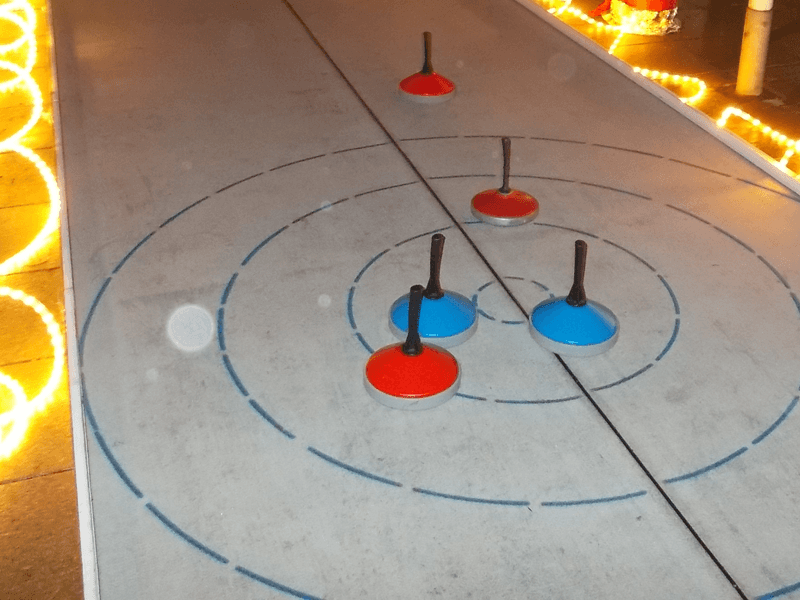 Eisstockbahn Indoor Weihnachtsfeier Firma