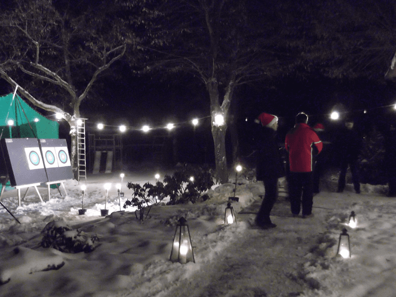 Betriebs Weihnachtsfeier Fackelwanderung und Bogenschießen