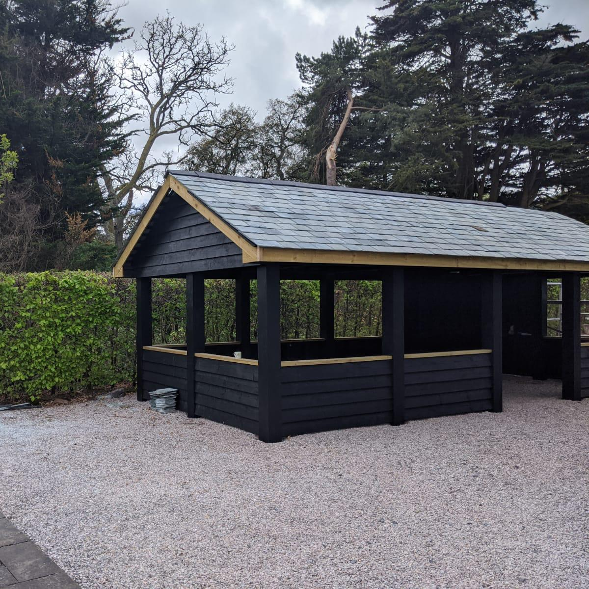 Finished slate roof installation on traditional property by roofers in Exeter